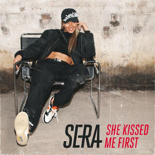 Album cover art for She Kissed Me First